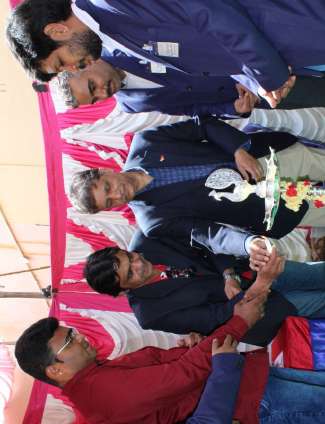 Referees scoring a match